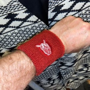One pair of red Tokyo Five wristband sweatbands. One size fits all.