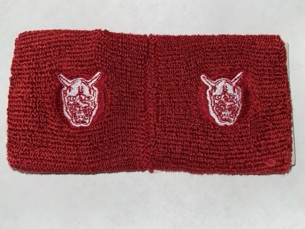 One pair of red Tokyo Five wristband sweatbands. One size fits all.
