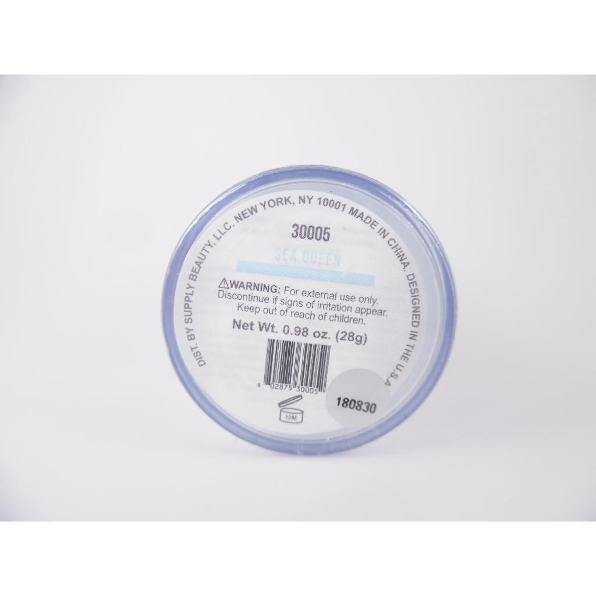 Holographic/iridescent cosmetic base / highlighter, light blue, box of three sticks.